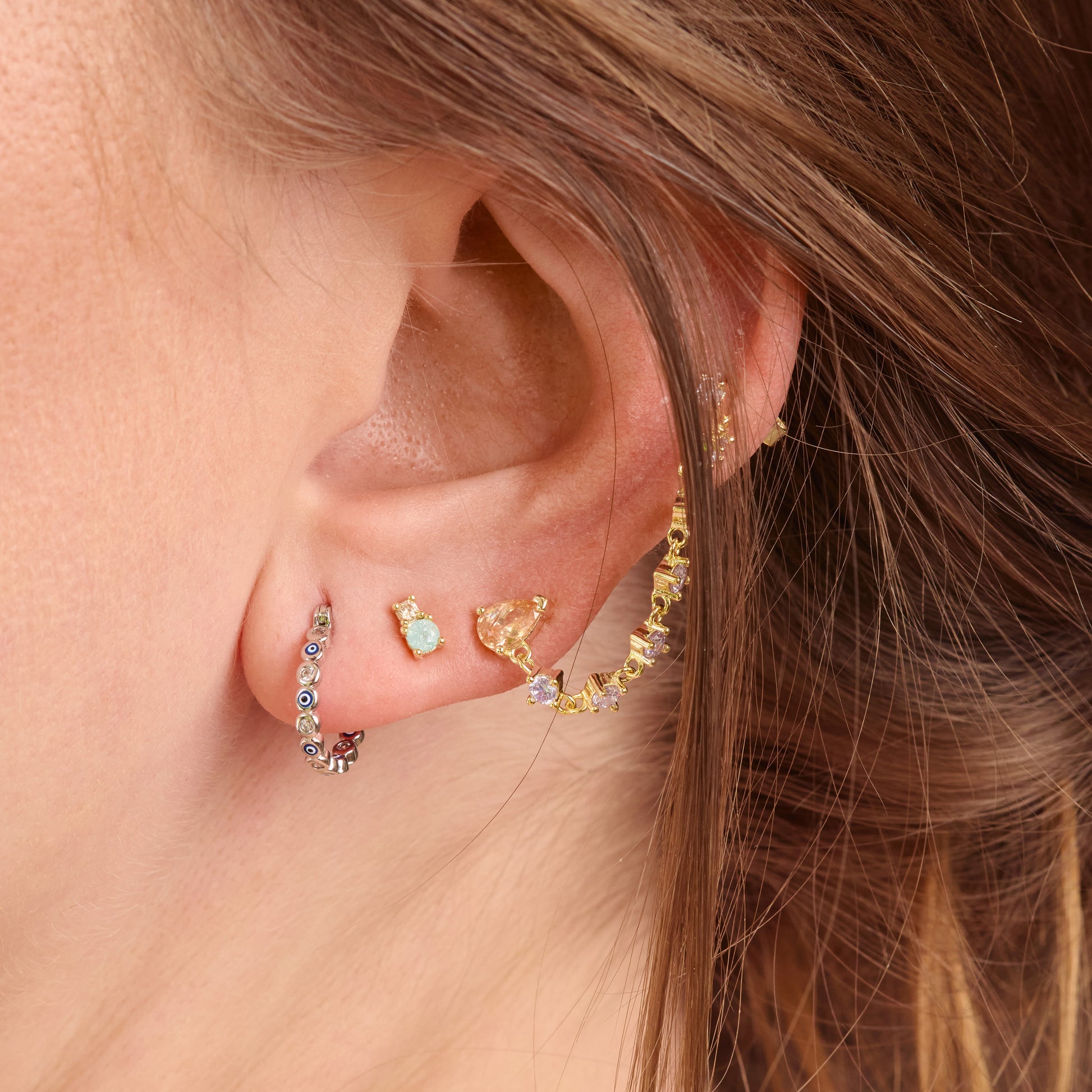 Piercing Constelación Dorada